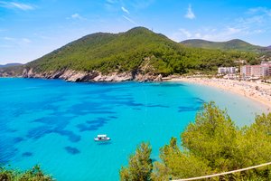 Turquoise sea and beach in Ibiza, car hire by easyCar