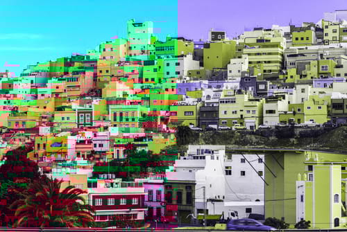 Colourful houses on the hillside in Las Palmas, car hire from easyCar