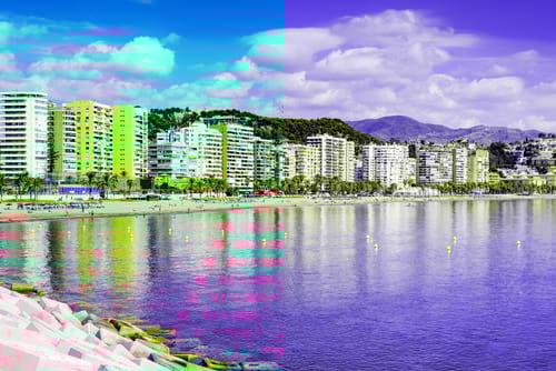 Blue sea and high rises in Malaga, car hire by easyCar